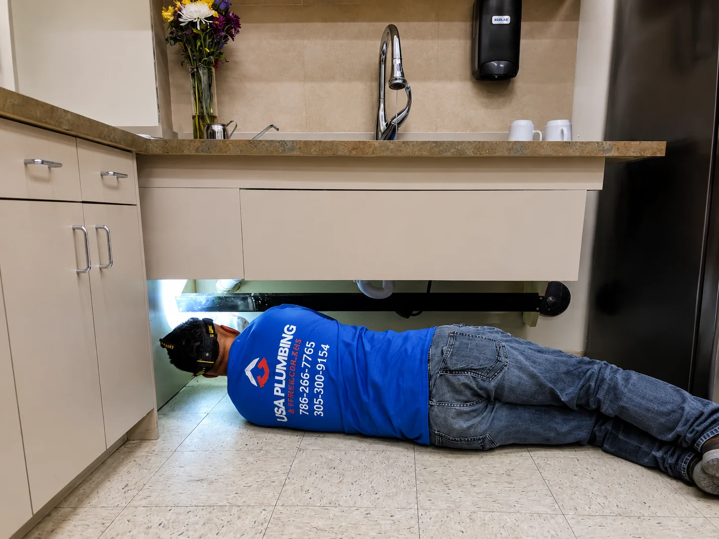 Emergency plumbing repair under-sink service by USA Plumbing & Trenchless